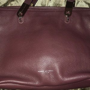 Burgundy leather good. Marc Jacob